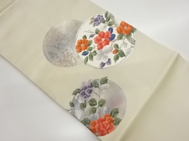 丸に草花模様織出し名古屋帯